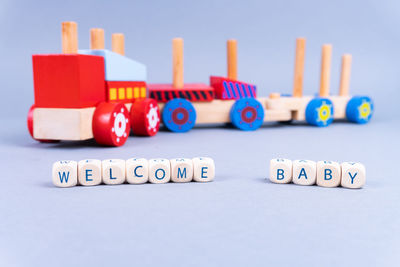 Close-up of toys against blue background