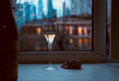 Close-up of wine in glass on table