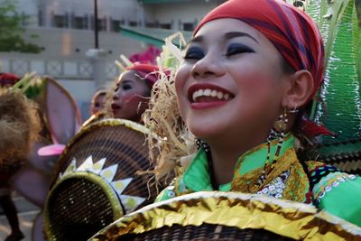 Close-up of smiling woman outdoors