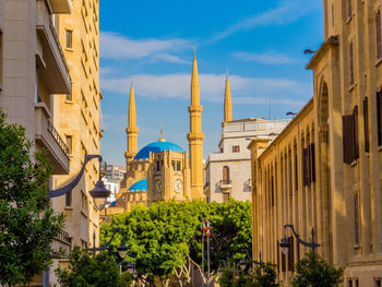 Panoramic view of buildings against sky