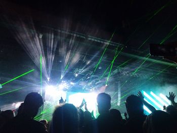 People enjoying music concert