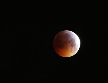 Scenic view of moon against sky at night