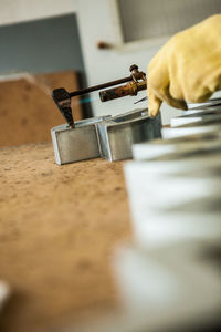 Close-up of person preparing food on table