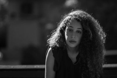 Portrait of a beautiful young woman outdoors