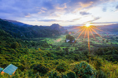 Scenic view of landscape against sky during sunset