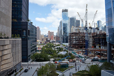 Buildings in city against sky