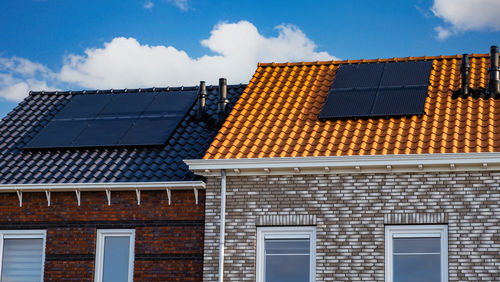 Low angle view of roof against sky