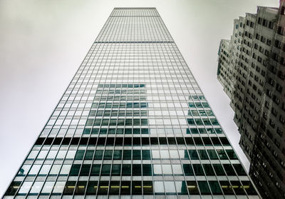 Low angle view of modern buildings against clear sky