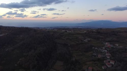 Scenic view of landscape against sky during sunset