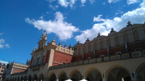 Low angle view of building against blue sky