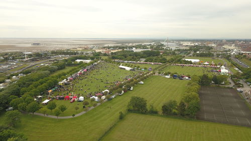 High angle view of trees on field against sky