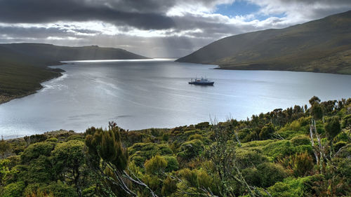 Scenic view of bay against sky