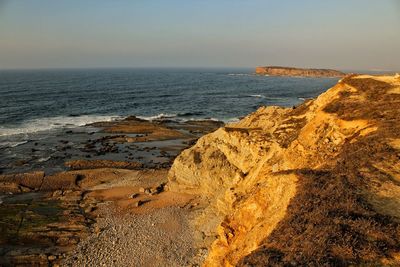 Scenic view of sea against clear sky