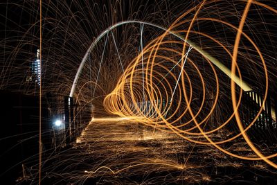 Light trails over river at night