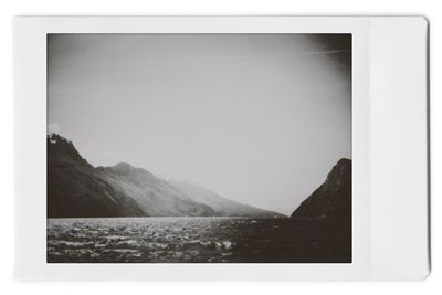 Scenic view of sea seen through window