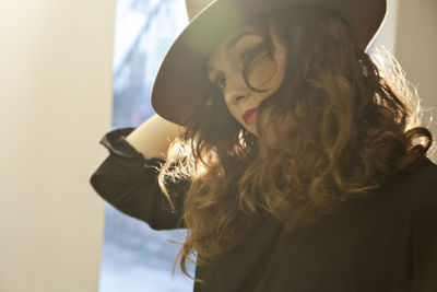 Portrait of young woman looking away