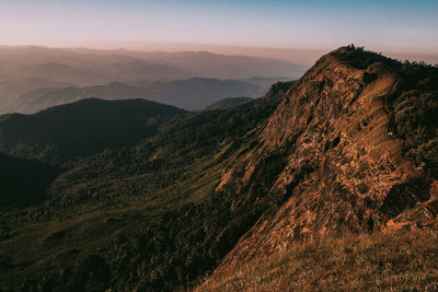 Scenic view of mountains against sky during sunset