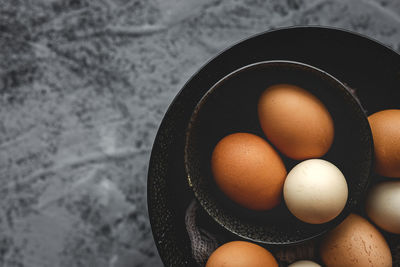 High angle view of eggs in container