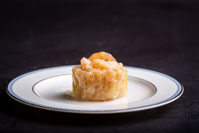 Close-up of dessert served on table