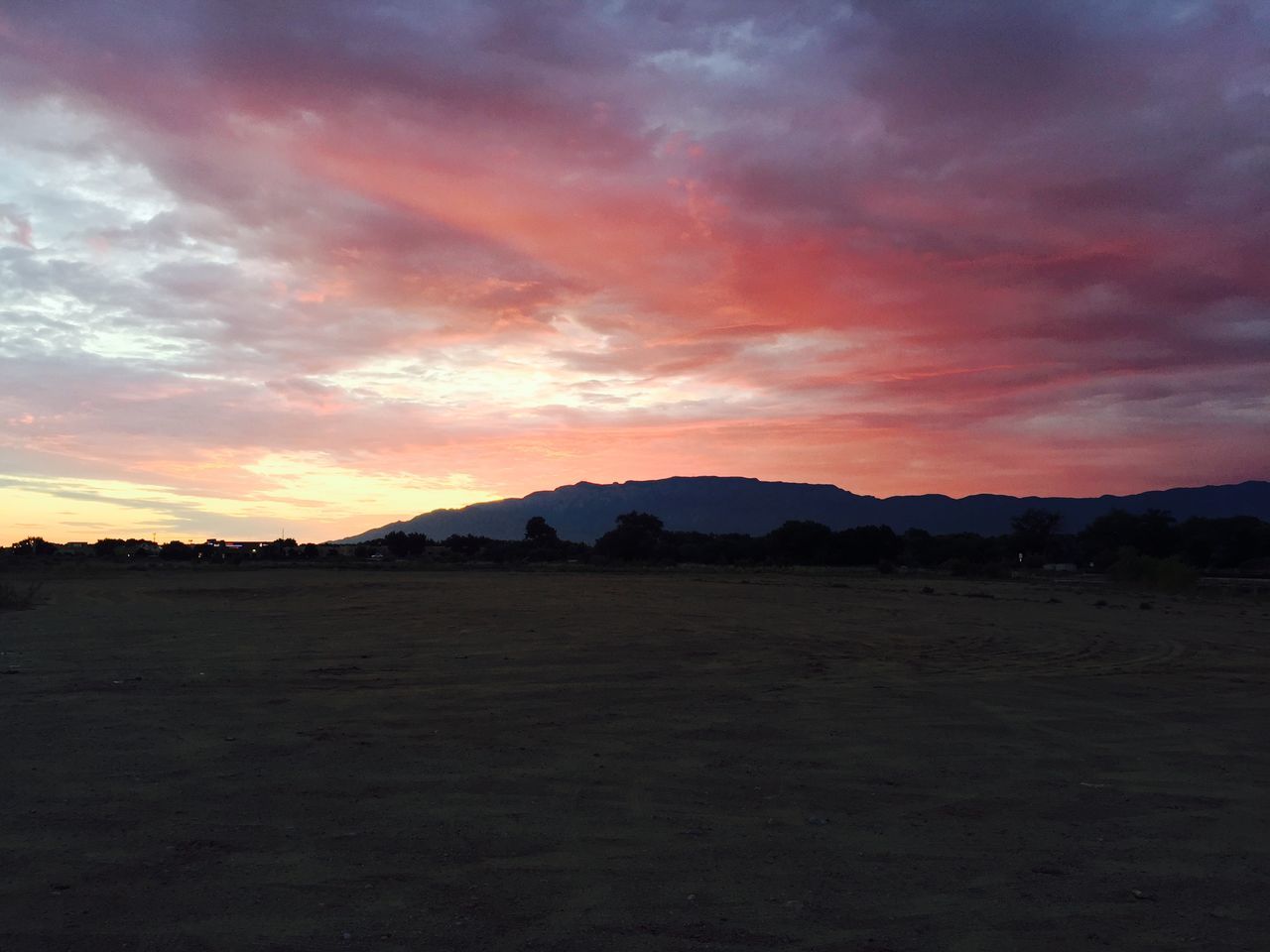 sunset, sky, tranquil scene, scenics, tranquility, mountain, landscape, beauty in nature, cloud - sky, orange color, silhouette, mountain range, nature, idyllic, cloud, dramatic sky, cloudy, dusk, non-urban scene, remote