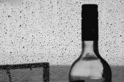 Close-up of water drops on glass window