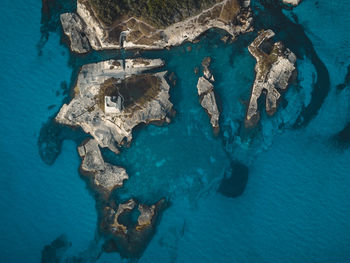 High angle view of people swimming in sea