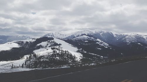 Snowcapped mountains against sky