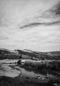 Scenic view of land against sky