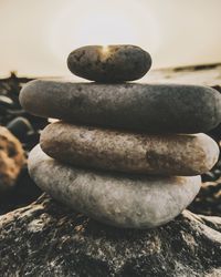 Close-up of stone stack on rock