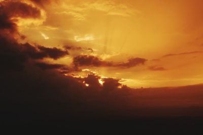 Low angle view of dramatic sky during sunset