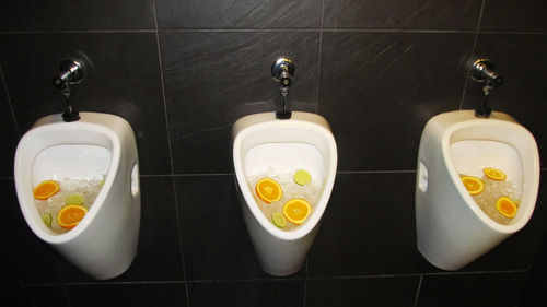 Close-up of faucet in bathroom