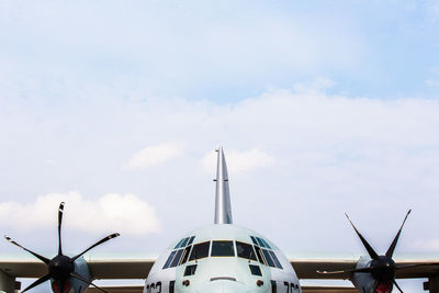 Low angle view of airplane against sky