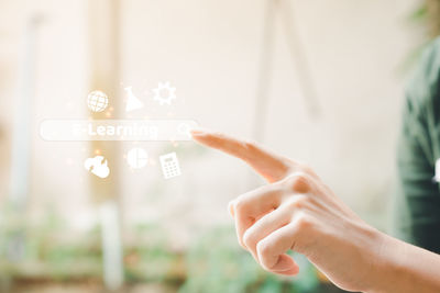 Close-up of hand holding smart phone