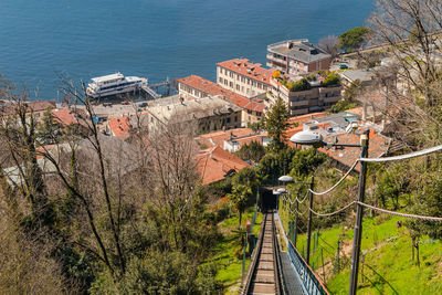 The rails and impressive distant view at electric funicular funicolare lake como, lombardy, italy