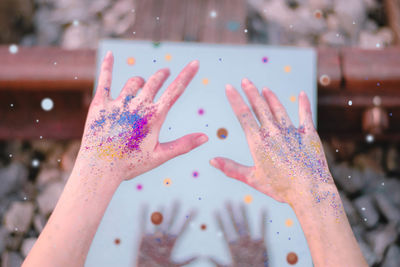 Close-up of hands with glitter