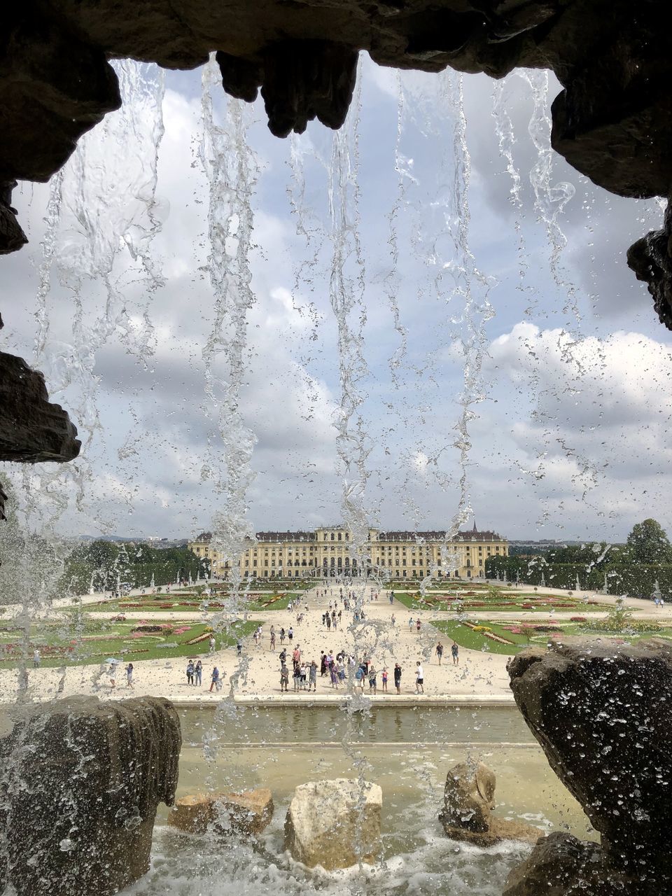 GROUP OF PEOPLE IN FOUNTAIN