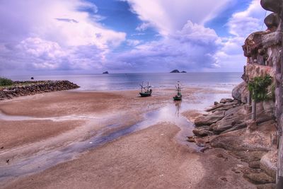 Scenic view of beach against sky