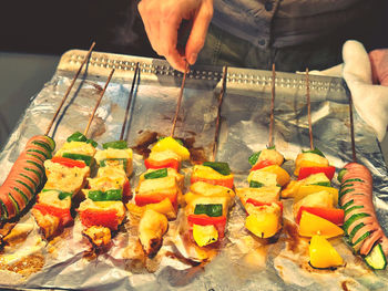 Midsection of man preparing food