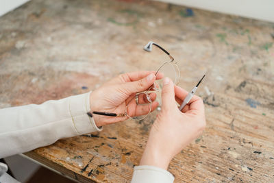 High angle view of woman holding hands