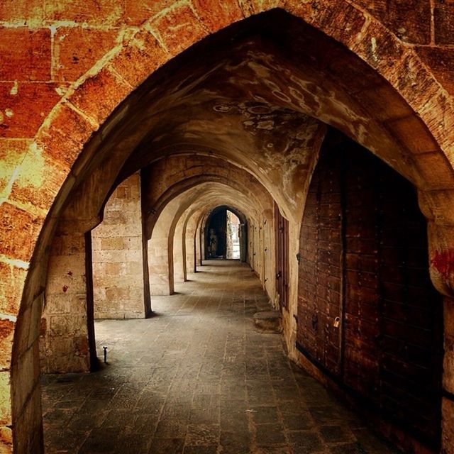 arch, the way forward, architecture, indoors, built structure, diminishing perspective, archway, tunnel, corridor, old, history, vanishing point, empty, wall - building feature, entrance, narrow, day, building, wall, no people