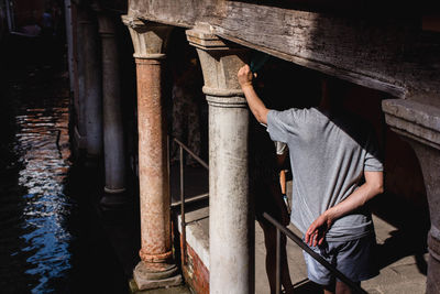 High angle view of couple standing in balcony