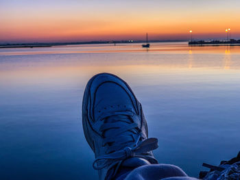 Scenic view of sea against sky at sunset