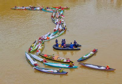 High angle view of people on boat in river