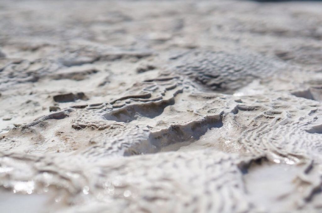 HIGH ANGLE VIEW OF A SAND