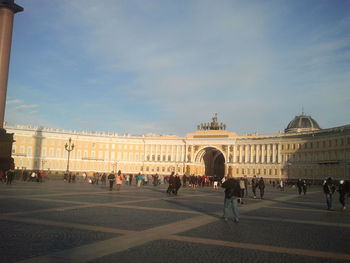 Tourists in front of historical building