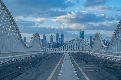 Maidan bridge dubai with dubai skyline