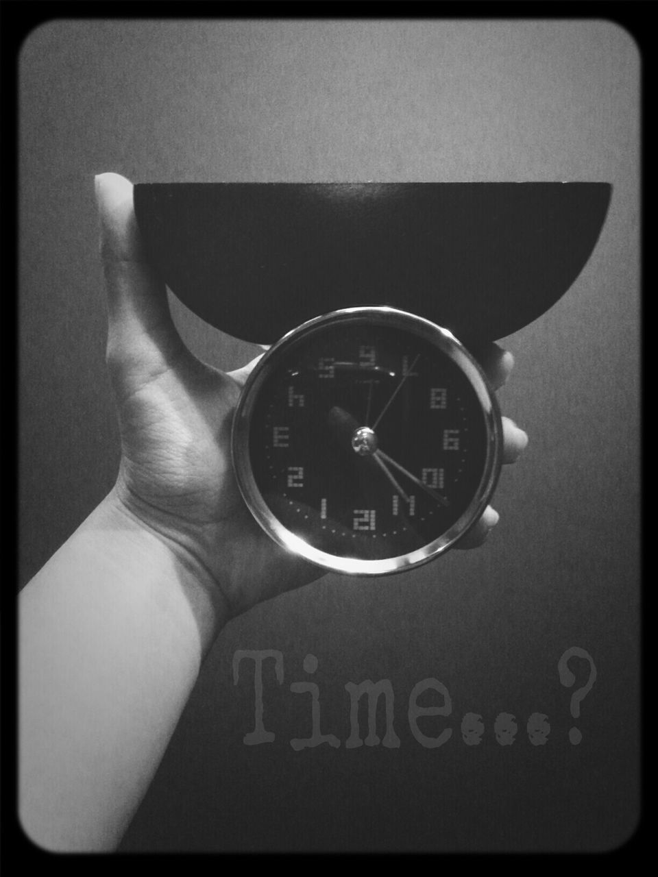 transfer print, communication, text, indoors, close-up, auto post production filter, number, western script, technology, clock, time, person, old-fashioned, part of, holding, accuracy, single object, retro styled, one person, photography themes