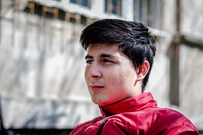 Close-up of young man looking away