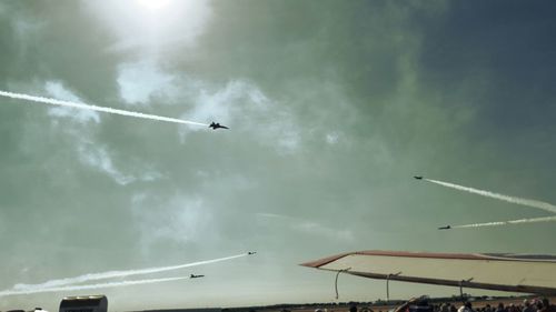 Low angle view of airplane flying in sky