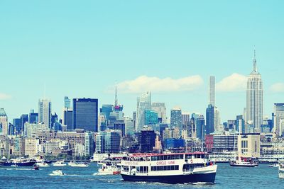 City skyline with sea in background